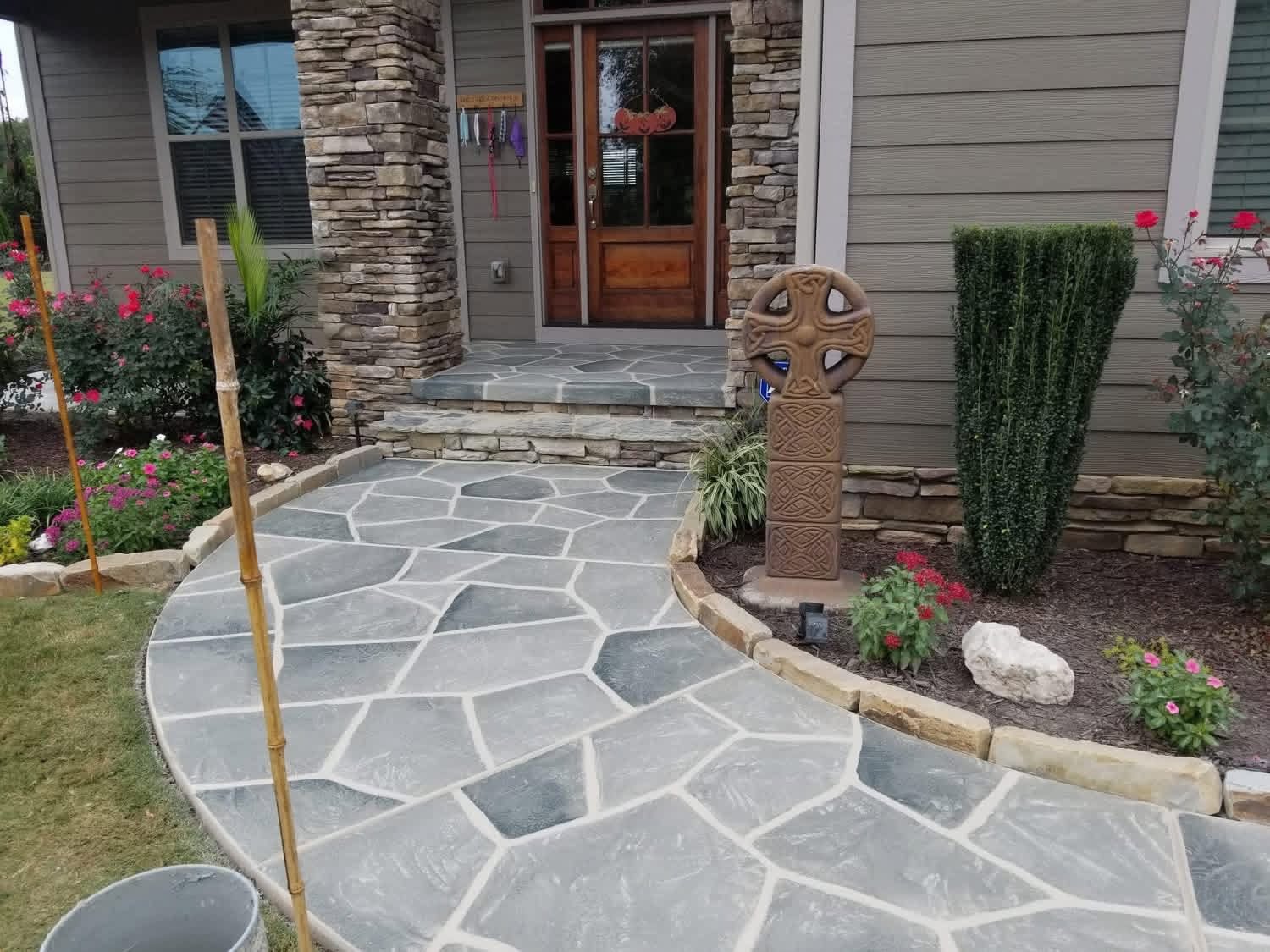 Hand-carved stone walkway leading to a craftsman home in Greenville, South Carolina